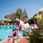 View of our venue and swimming pool with beautiful flowers